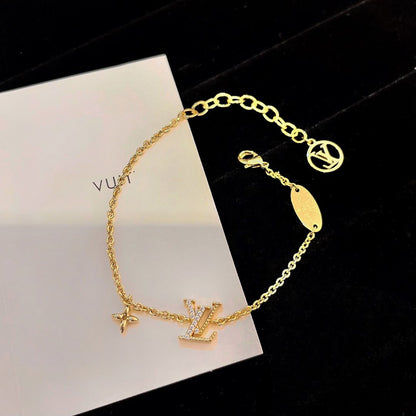 [Luxery]LOGO STAR MOTIF GOLD BRACELET