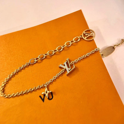 [Luxery]LOGO STAR MOTIF GOLD BRACELET