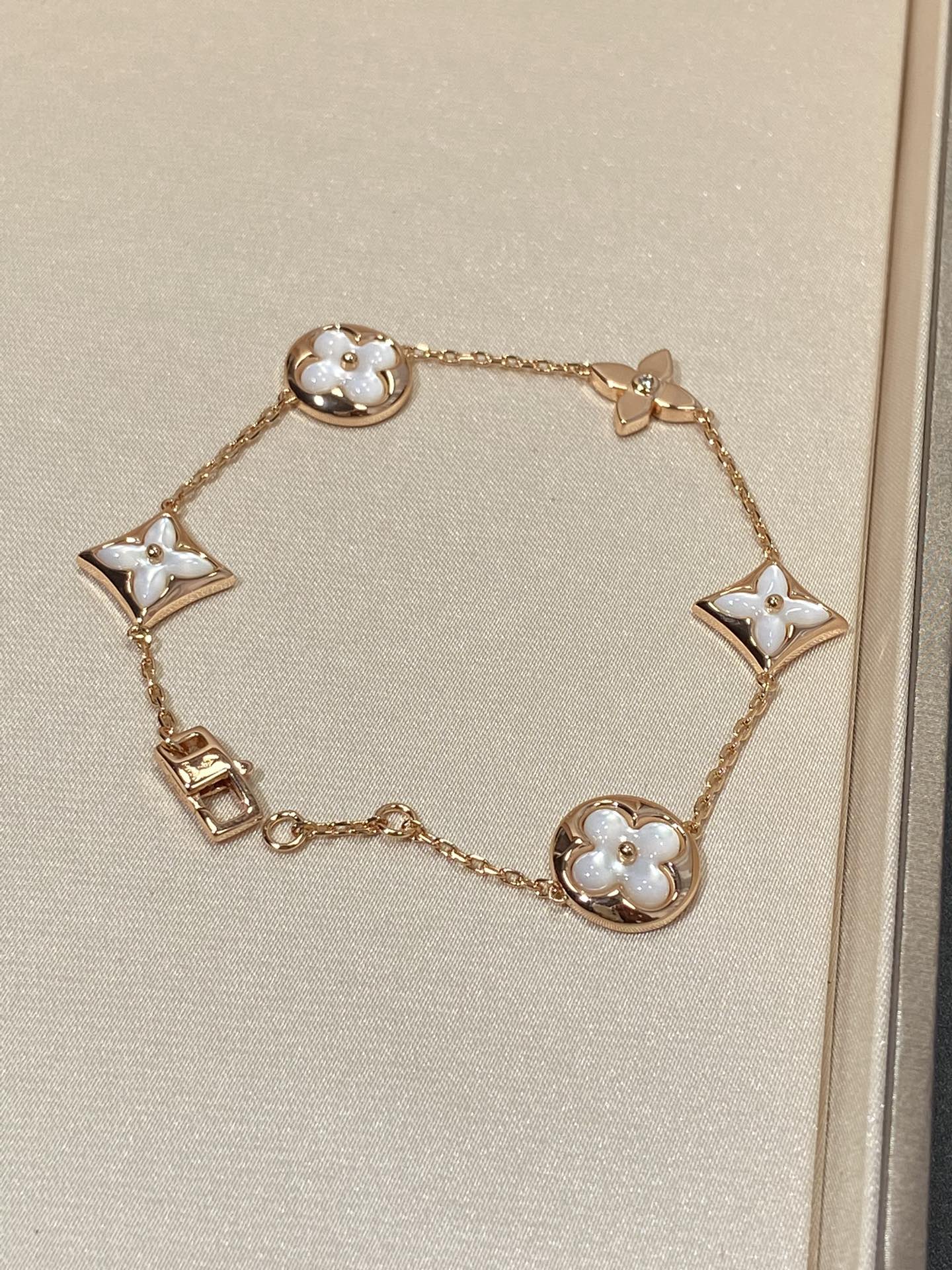 [Luxery]STAR AND SUN 5 MOTIF MOP PINK GOLD BRACELET
