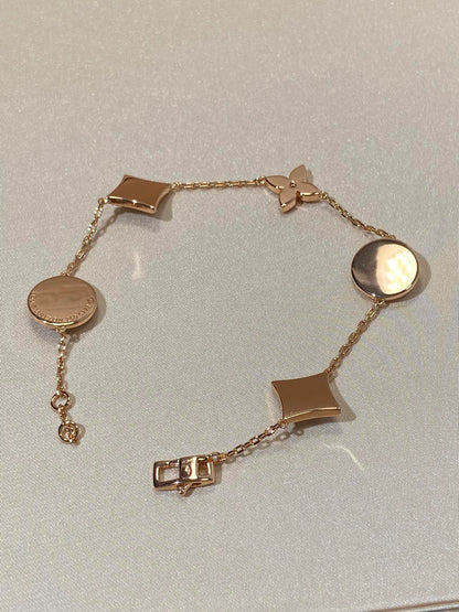 [Luxery]STAR AND SUN 5 MOTIF MOP PINK GOLD BRACELET