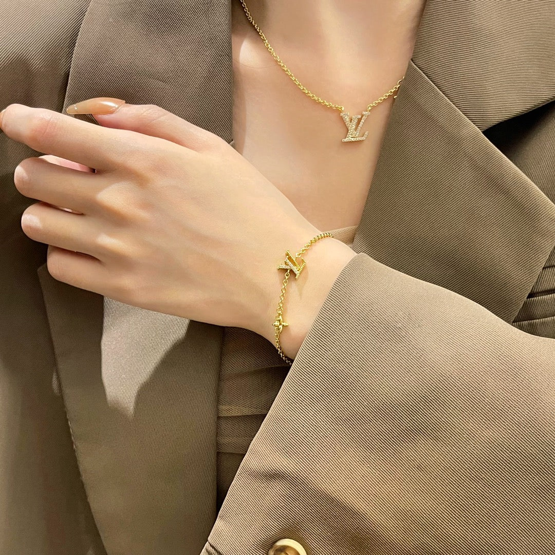 [Luxery]LOGO STAR MOTIF GOLD BRACELET