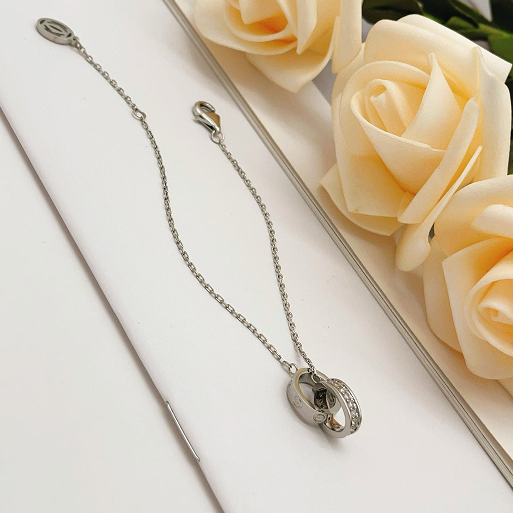 [⭐Luxery]LOVE DOPPELRING-ARMBAND MIT HALB-DIAMANTBESATZ