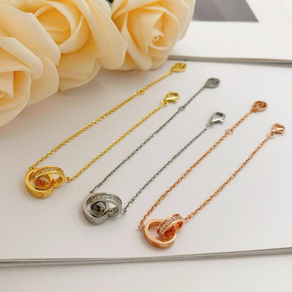 [⭐Luxery]LOVE DOPPELRING-ARMBAND MIT HALB-DIAMANTBESATZ