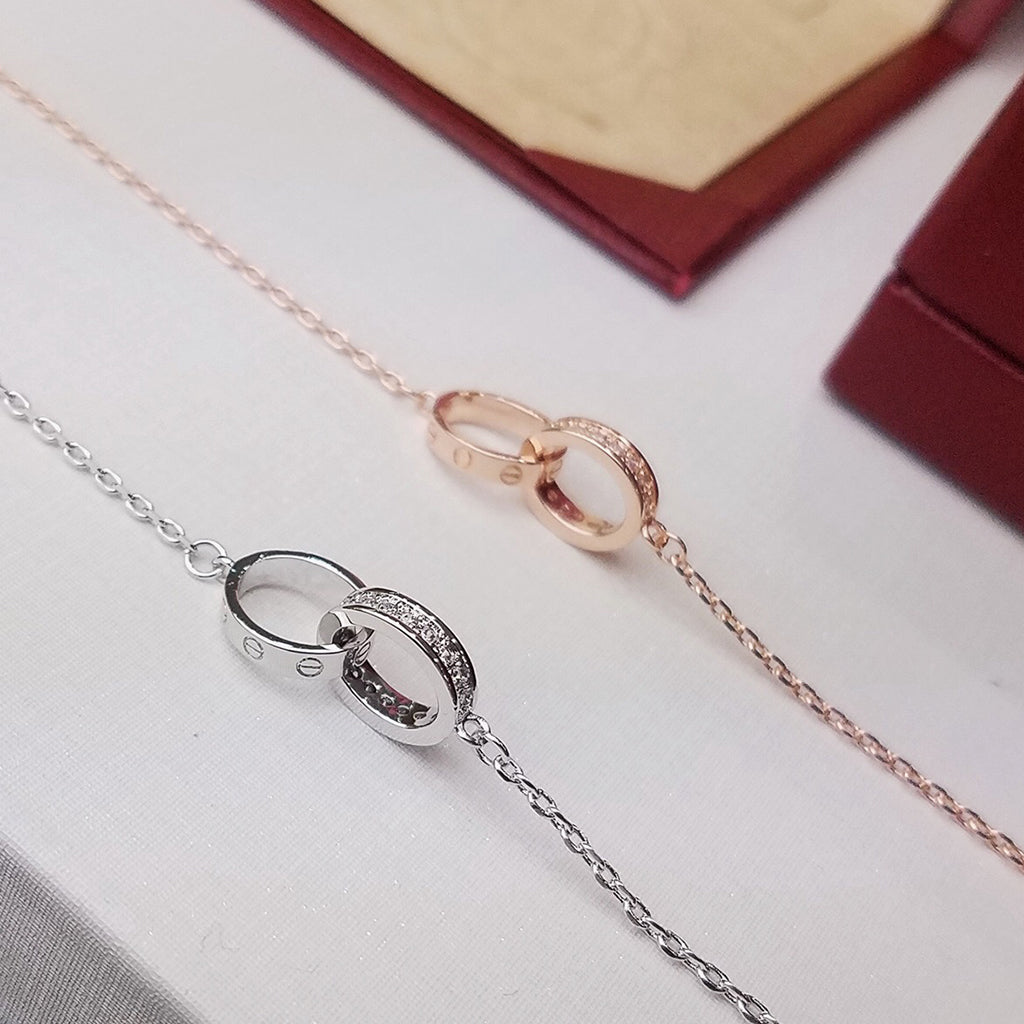 [⭐Luxery]LOVE DOPPELRING-ARMBAND MIT HALB-DIAMANTBESATZ